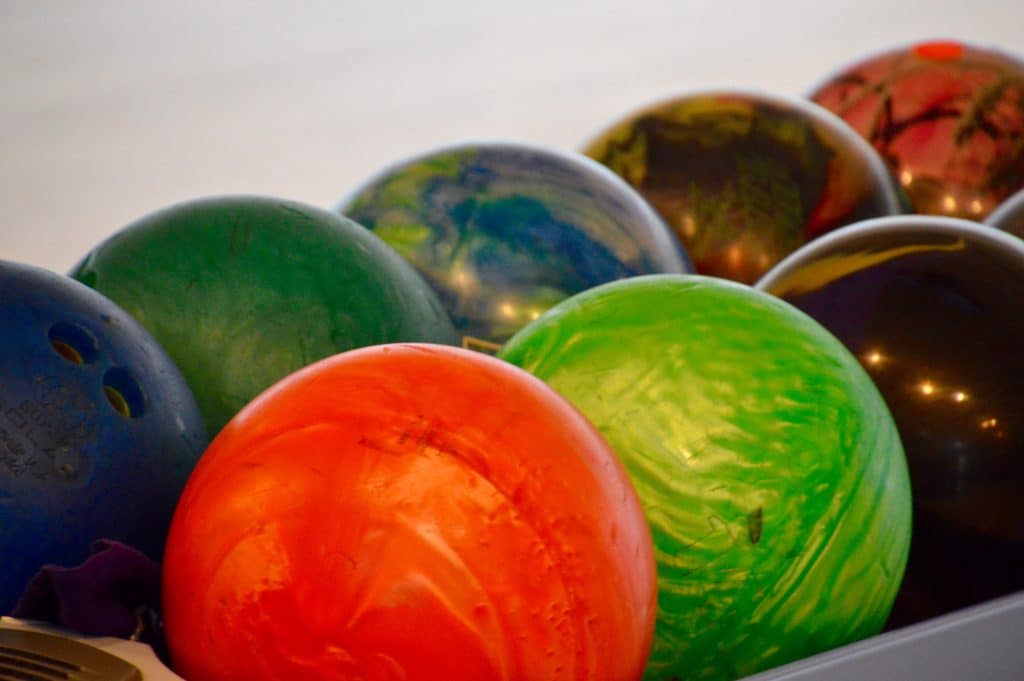 An image of colorful bowling balls at the Oviedo Bowling Center.