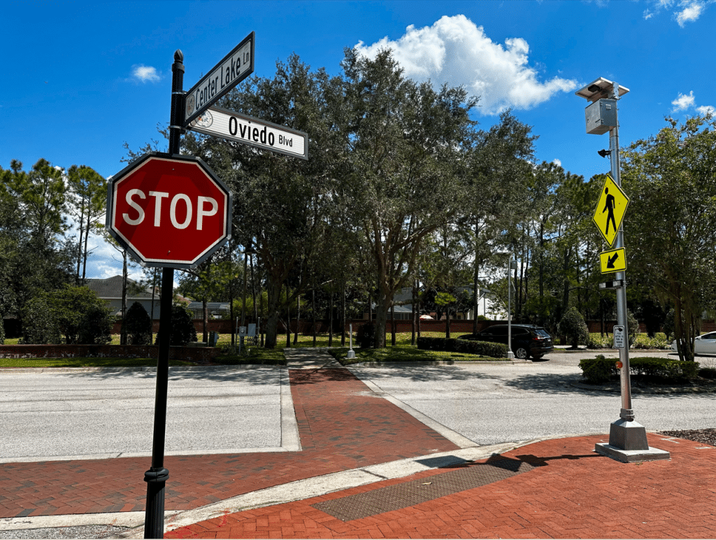 An image shows the Oviedo Boulevard and Center Lake Lane intersection.
