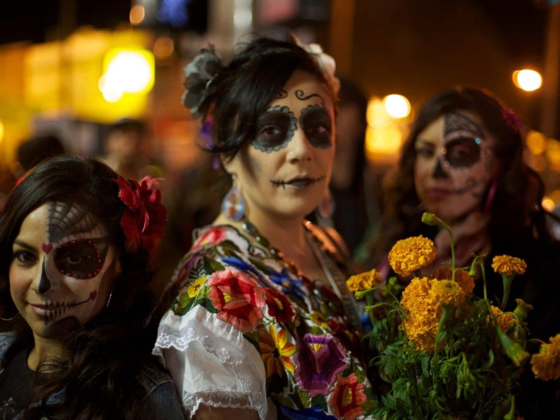 To show painted faces for Dia De Los Muertos