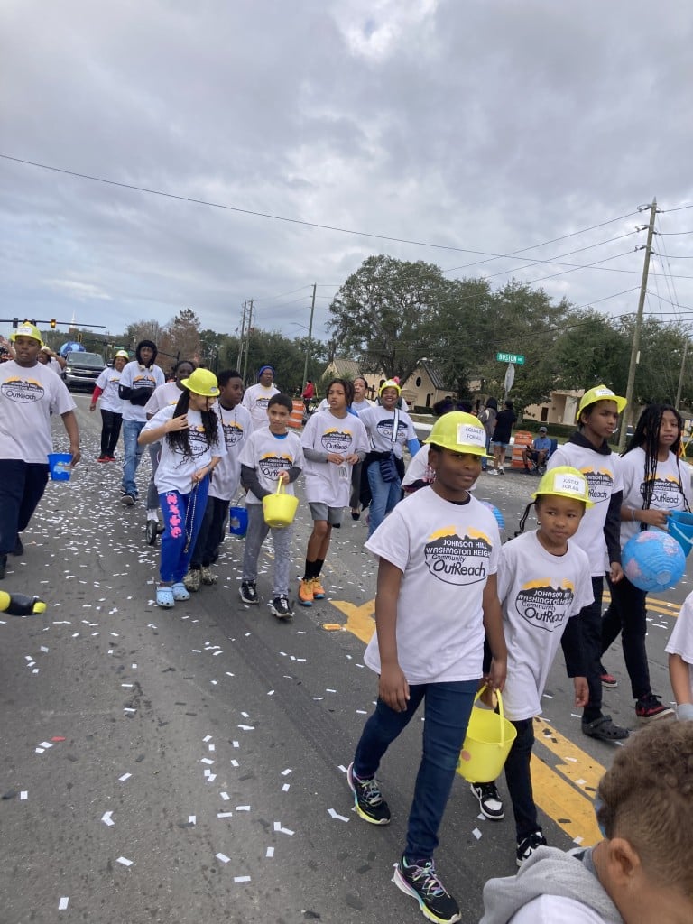 Johnson Hill Washington Heights Community Outreach donned bright yellow hard hats, signaling the building of positive change. 
