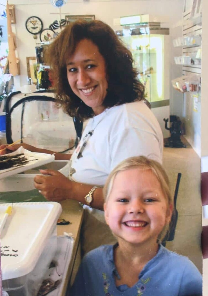 Edna Kane poses with her child